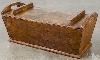 Pennsylvania painted pine dough box, 19th c., retaining its original yellow grained surface, 12 1/2''