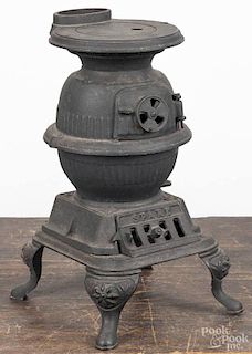 Grey Iron cast iron toy pot belly stove, early 20th c., inscribed Spark, 13 3/4'' h.