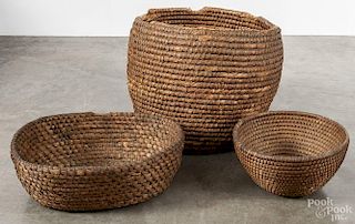 Three Pennsylvania rye straw baskets, 19th c., largest - 17 1/2'' h., 20'' w.