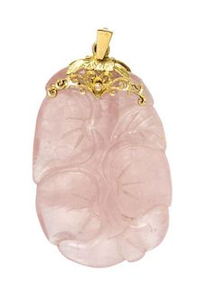A Yellow Gold and Carved Rose Quartz Pendant,