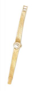 A Yellow Gold Wristwatch, Tissot, 19.40 dwts.