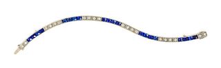 A Silver, Synthetic Sapphire and Diamond Line Bracelet, 8.80 dwts.