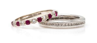 A Collection of Platinum, 14 Karat White Gold and Gemstone Eternity Bands, 5.50 dwts.
