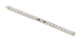 A 14 Karat White Gold, Synthetic Sapphire and Diamond bracelet 9.70 dwts.