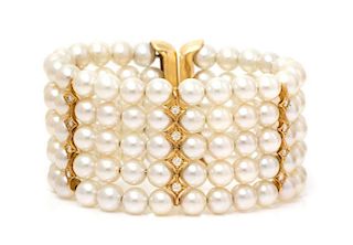 An 18 Karat Yellow Gold, Diamond and Cultured Pearl Flexible Cuff Bracelet, 56.10 dwts.
