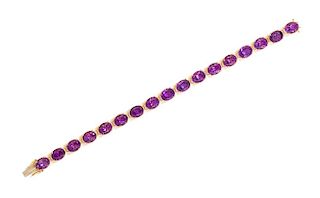 A Yellow Gold and Amethyst Line Bracelet, 14.60 dwts.