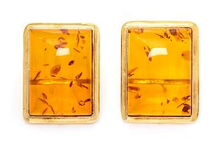 A Pair of 14 Karat Yellow Gold and Amber Earclips, 7.30 dwts.
