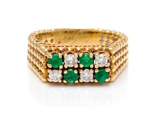 An 18 Karat Yellow Gold, Emerald and Diamond Ring, 4.80 dwts.