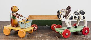 Painted wood articulated horse pull toy, 8 3/4'' l., together with a painted wood wagon and a bear pl