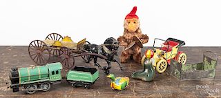 Group of miscellaneous toys, to include a Lehmann Seal, a tin litho wind-up duck, a cast iron horse