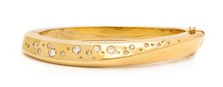 A 14 Karat Yellow Gold and Diamond Bangle Bracelet, 54.60 dwts.