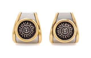 A Pair of 18 Karat Gold, Steel, Stainless Silver, and Sun Motif Coin Earclips, Marina B, Circa 1984, 18.90 dwts.