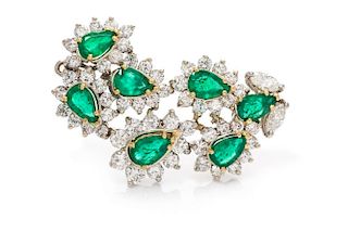 A Bicolor Gold, Emerald and Diamond Brooch, 6.40 dwts.