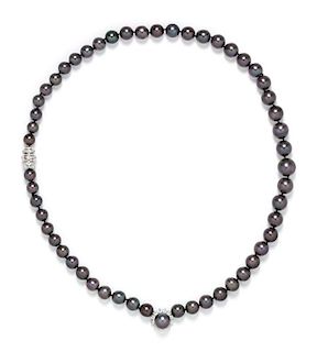 A White Gold, Platinum, Diamond and Cultured Tahitian Pearl Necklace, 78.20 dwts.