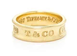 An 18 Karat Yellow Gold "Tiffany 1837" Band, Tiffany & Co., Circa 1997, 4.95 dwts.