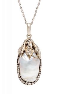 A Silver Topped Gold, Baroque Pearl and Diamond Pendant, 10.10 dwts.