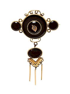 A Victorian Gold Filled, Onyx, and Seed Pearl Brooch, 6.00 dwts.