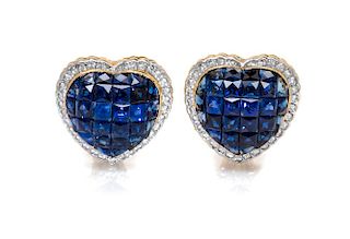 A Pair of 18 Karat Yellow Gold, Invisibly Set Sapphire and Diamond Heart Motif Earclips, 6.20 dwts.