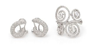 A Collection of 18 Karat White Gold and Diamond Jewelry, 8.10 dwts.