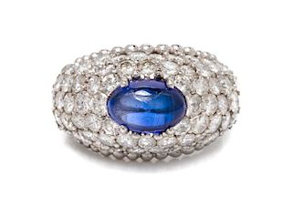 A Platinum, Synthetic Sapphire and Diamond Ring, 9.40 dwts.