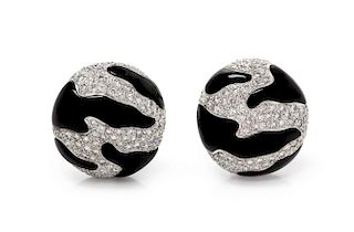 A Pair of 18 Karat White Gold, Diamond and Onyx Earclips, 10.60 dwts.