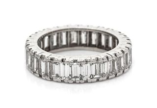 A Platinum, White Gold and Diamond Eternity Band, 4.10 dwts.