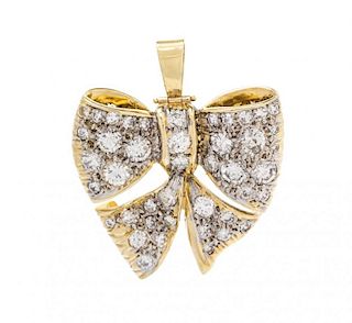 A Yellow Gold and Diamond Bow Pendant/Brooch, 8.70 dwts.