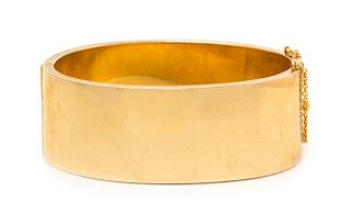 An 18 Karat Yellow Gold Hinged Bangle Bracelet, 46.60 dwts.