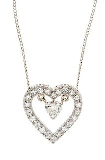 A White Gold and Diamond Heart Pendant, 2.80 dwts.
