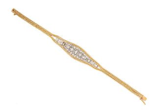 A 14 Karat Yellow Gold, Platinum and Diamond Bracelet, 14.20 dwts.