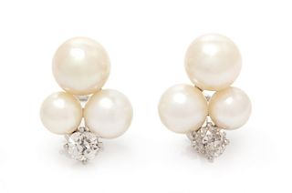 A Pair of 14 Karat White Gold, Diamond and Cultured Pearl Earclips, 5.90 dwts.