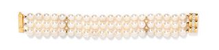 An 18 Karat Yellow Gold, Diamond and Cultured Pearl Triple Strand Bracelet, J. Koehle, 35.80 dwts.