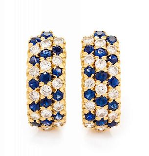 A Pair of 18 Karat Yellow Gold, Diamond and Sapphire Earclips, 5.80 dwts.