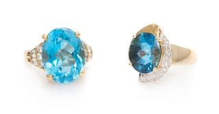 A Collection of Yellow Gold and Blue Topaz Rings, 8.70 dwts.