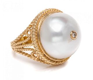A Yellow Gold, Cultured Button Pearl and Diamond Ring, 8.40 dwts.
