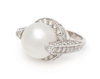 An 18 Karat White Gold, Cultured South Sea Pearl and Diamond Ring, 6.80 dwts.