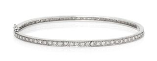 An 18 Karat White Gold and Diamond Bangle Bracelet, 5.50 dwdts.