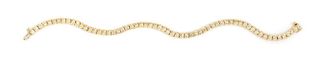 A 14 Karat Yellow Gold and Diamond Line Bracelet, 12.10 dwts.