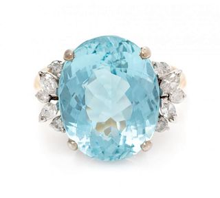 A Bicolor Gold, Aquamarine and Diamond Ring, 4.6 dwts.