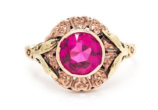 A 10 Karat Bicolor Gold and Synthetic Ruby Ring, 1.80 dwts.