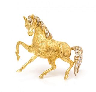 An 18 Karat Bicolor Gold and Diamond Horse Motif Brooch, 4.70 dwts.