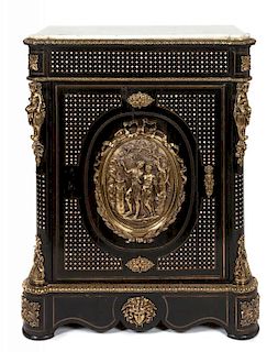 * A Napoleon III Ebonized, Mother-of-Pearl Inlaid, and Gilt Metal Mounted Cabinet Height 44 x width 34 x depth 16 inches.