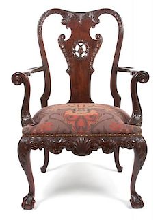 A Chippendale Style Carved Armchair Height 42 inches.