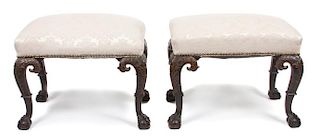 A Pair of Chippendale Style Carved Benches Height 20 x width 24 1/4 x depth 16 inches.