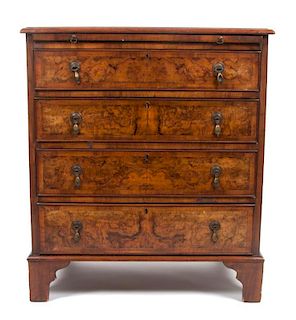 An English Burlwood Bachelor's Chest Height 33 x width 28 x depth 17 1/2 inches.