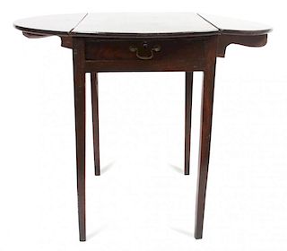 An English Drop-Leaf Table Height 27 3/4 x width 36 (open) x depth 30 inches.