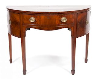 A George III Style Mahogany Demilune Table Height 34 1/2 x width 46 x depth 24 inches.