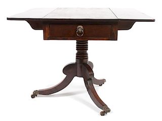 An English Drop-Leaf Side Table Height 28 1/2 x width 19 1/2 (closed) x depth 39 1/4 inches.