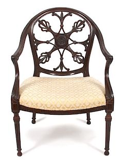 An English Carved Armchair Height 35 1/2 inches.
