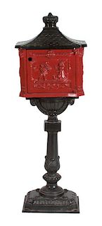 A Painted Victorian Cast Iron Mailbox Height 45 x width 15 1/2 x depth 11 inches.
